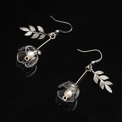 just a flower earrings clear silver